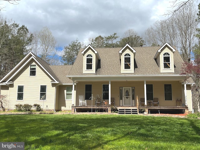 view of front facade with a porch and a front lawn