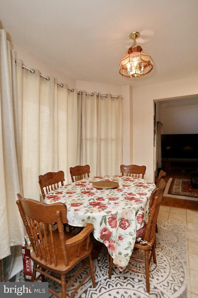 dining room featuring tile patterned flooring