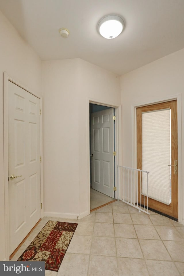 interior space with light tile patterned floors