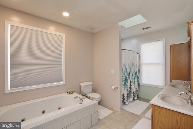 full bathroom featuring vanity, toilet, and independent shower and bath