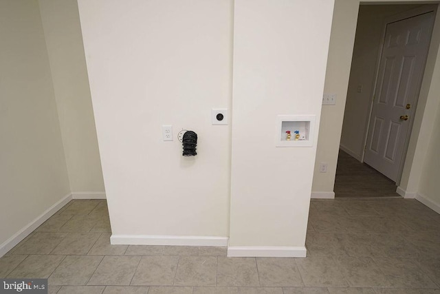 clothes washing area featuring hookup for a washing machine, electric dryer hookup, and light tile patterned flooring