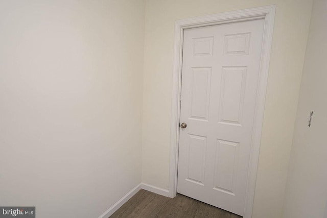 interior space with dark hardwood / wood-style floors