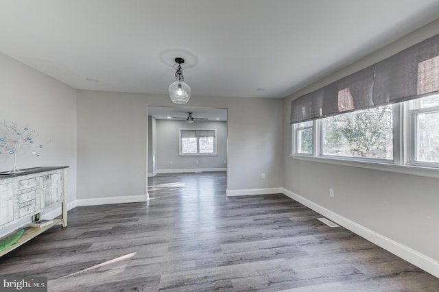 unfurnished room featuring hardwood / wood-style floors