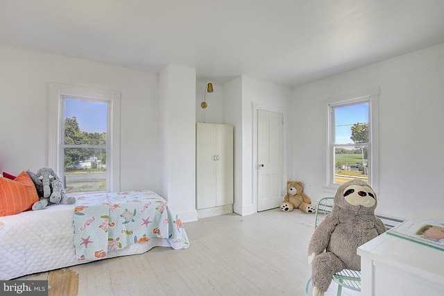 bedroom featuring light wood-type flooring