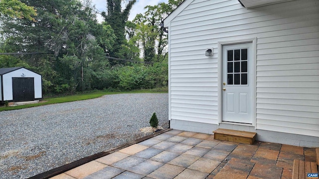 view of patio / terrace featuring a shed