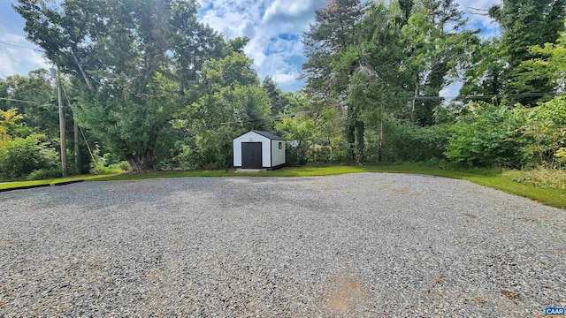 exterior space with a storage shed