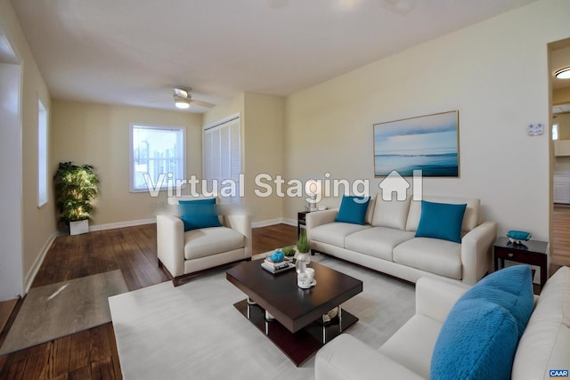 living room with wood-type flooring and ceiling fan