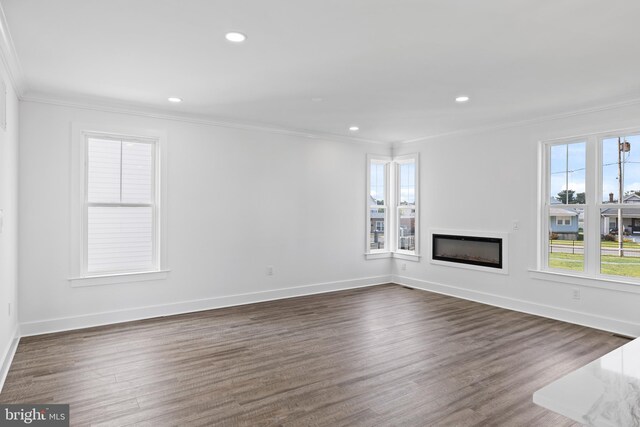 kitchen with white cabinets, dark hardwood / wood-style floors, sink, and hanging light fixtures