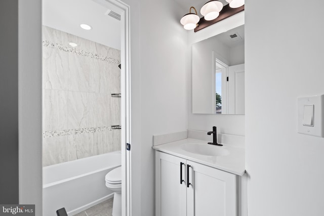 bathroom with shower / bathing tub combination, visible vents, toilet, and vanity