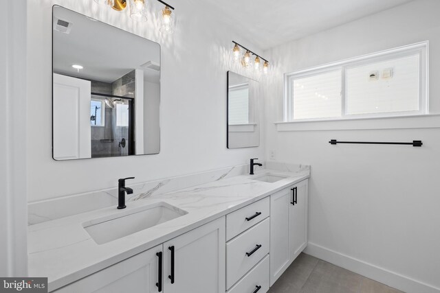 full bathroom featuring shower / tub combination, vanity, toilet, and tile patterned floors