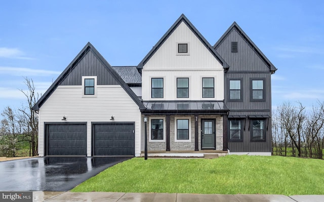 modern farmhouse style home with a garage and a front yard