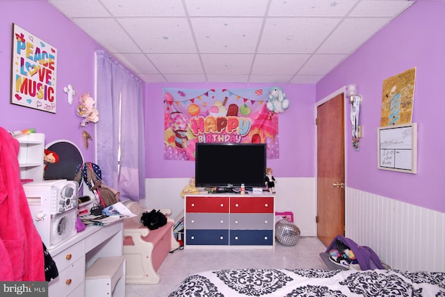 bedroom featuring a drop ceiling