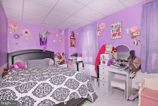 bedroom featuring a drop ceiling