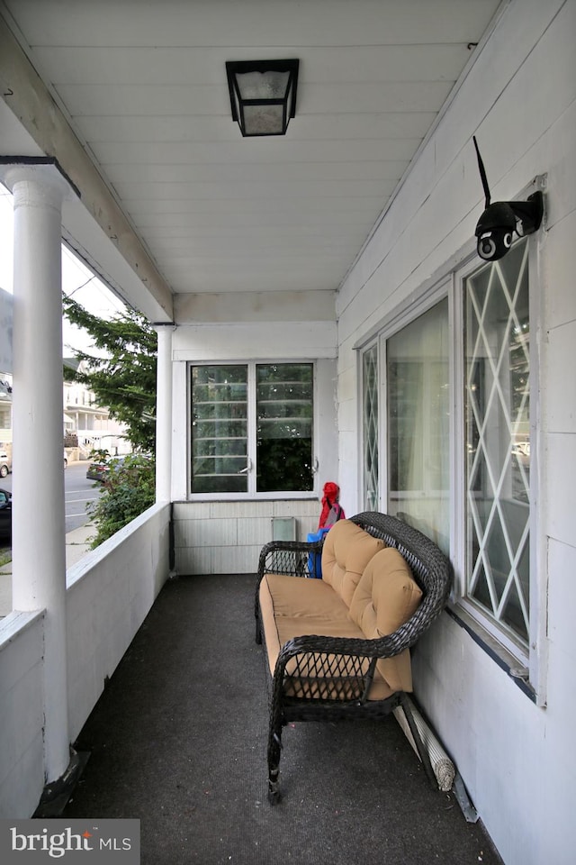 balcony featuring covered porch