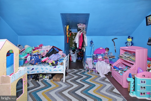 bedroom with vaulted ceiling