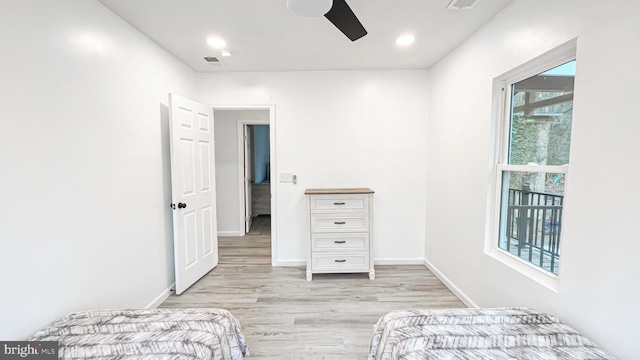 bedroom featuring ceiling fan and light hardwood / wood-style floors