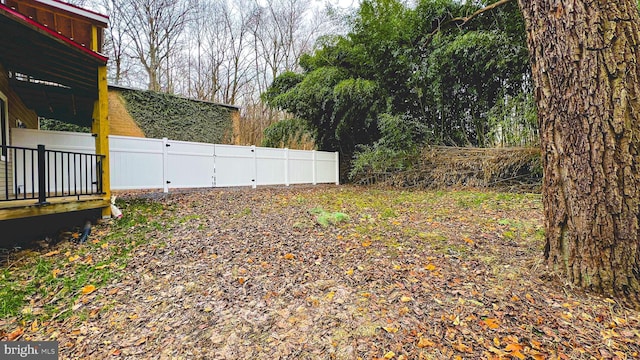 view of yard featuring a deck