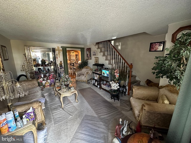 living room with a textured ceiling