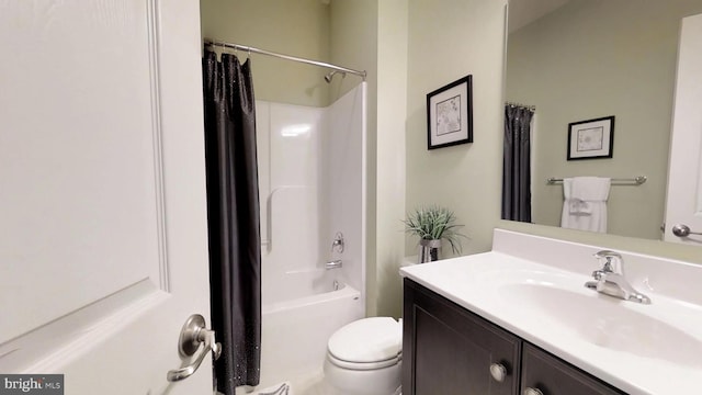 full bathroom featuring vanity, toilet, and shower / bathtub combination with curtain