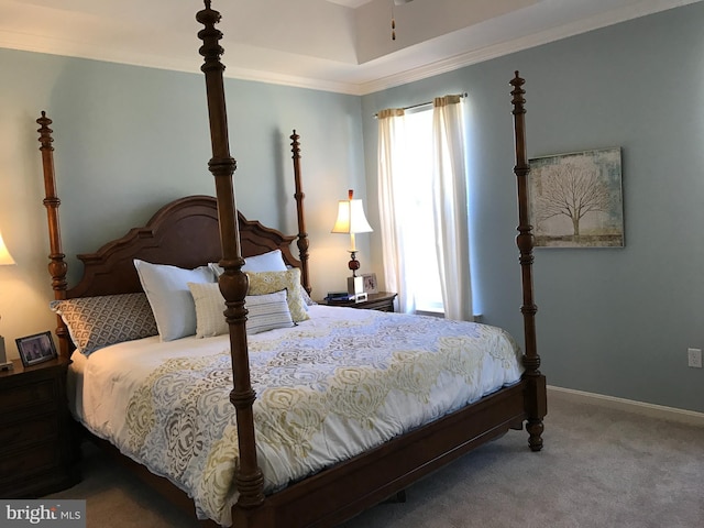 carpeted bedroom with ornamental molding