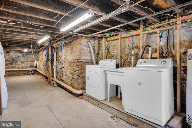 basement featuring washer and dryer