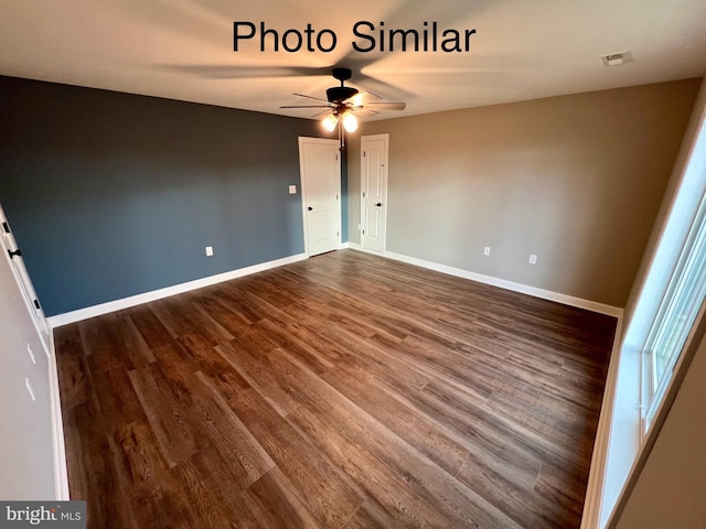 interior space with dark hardwood / wood-style flooring