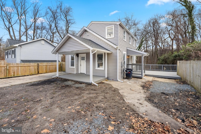 view of property featuring a patio area