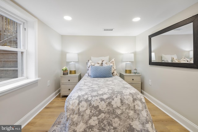 bedroom featuring light wood-type flooring