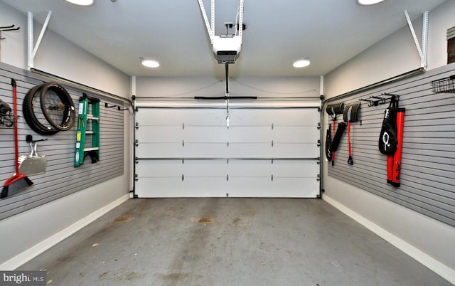 garage featuring a garage door opener