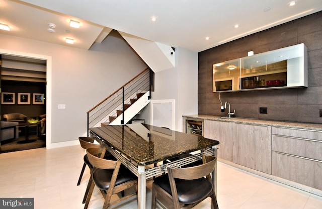 dining room featuring bar and beverage cooler