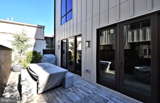 deck featuring french doors and grilling area