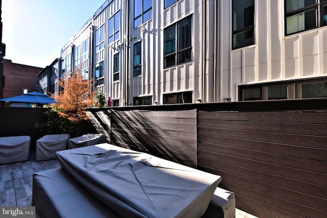 view of property exterior with a balcony