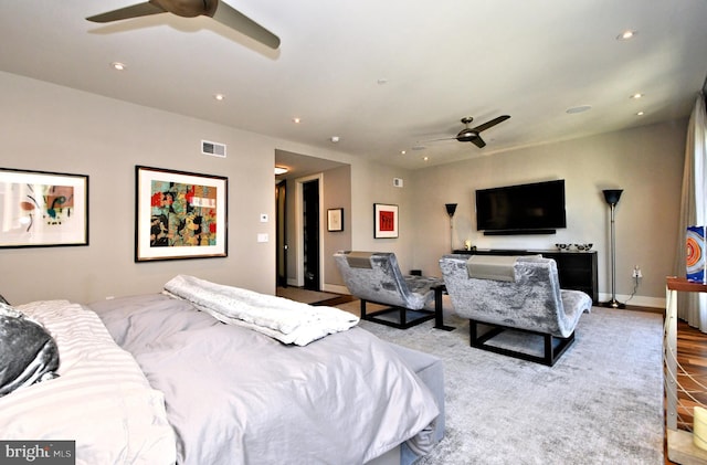 bedroom with ceiling fan and light tile patterned flooring