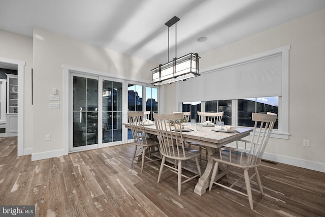 dining room featuring hardwood / wood-style flooring