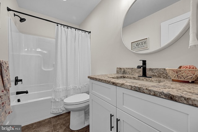 full bathroom with vanity, toilet, and shower / tub combo