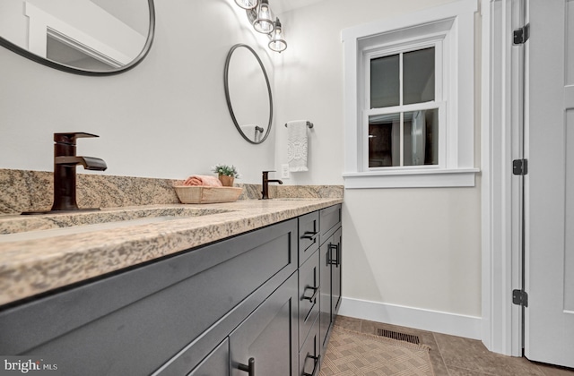 bathroom featuring vanity and tile patterned floors