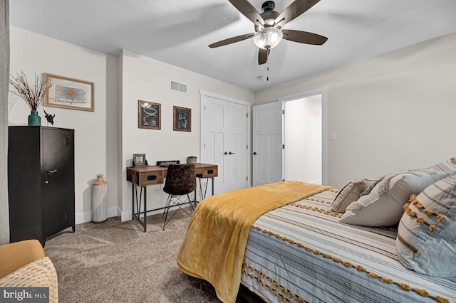 bedroom featuring light carpet and ceiling fan