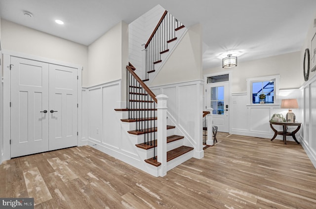 entryway with light hardwood / wood-style flooring