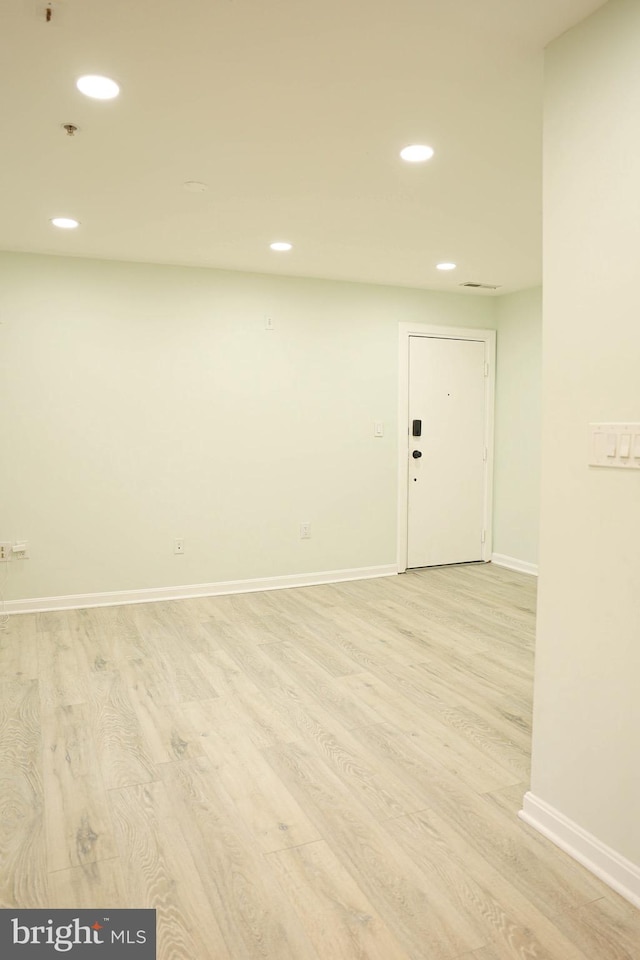 empty room featuring light hardwood / wood-style floors