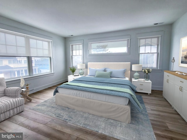 bedroom with light hardwood / wood-style flooring