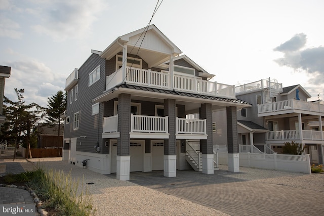 view of front of house with a balcony