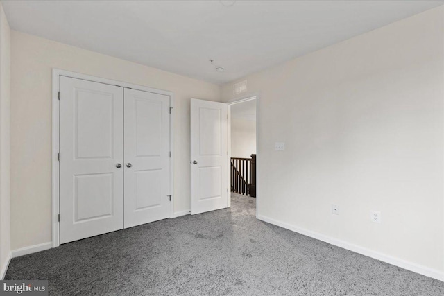 unfurnished bedroom featuring a closet