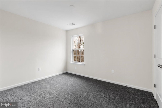 unfurnished room featuring carpet floors