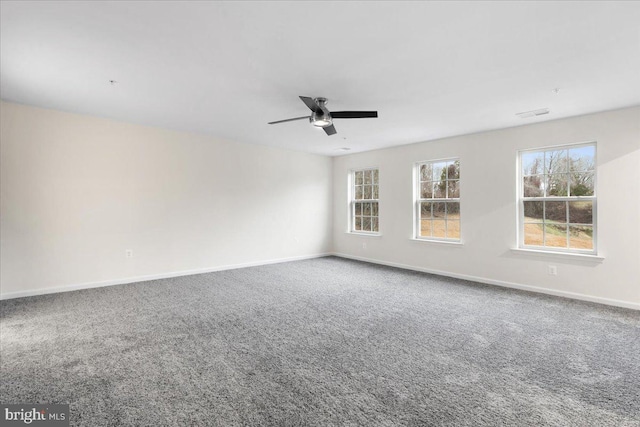 empty room with carpet flooring and ceiling fan