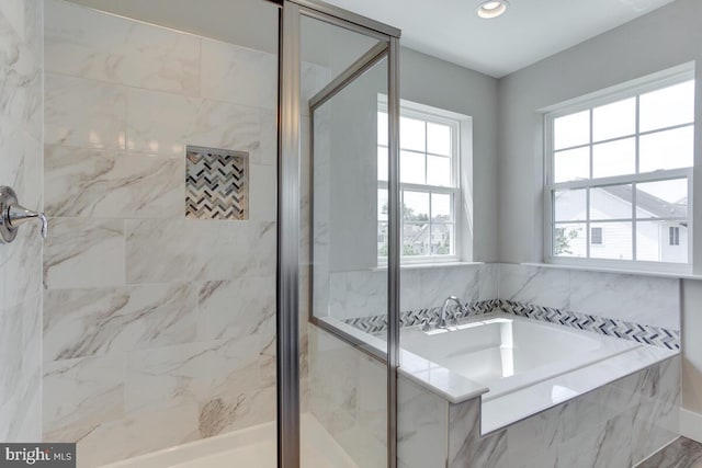 bathroom with independent shower and bath