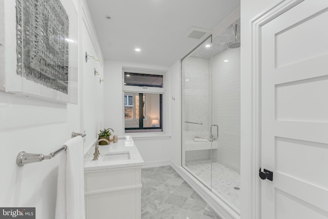 bathroom featuring vanity and walk in shower