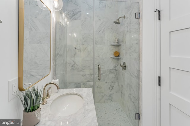 bathroom with sink and walk in shower