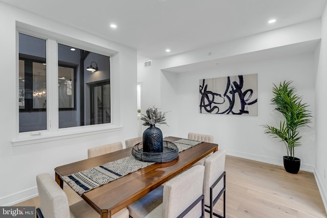 dining room featuring light wood-type flooring