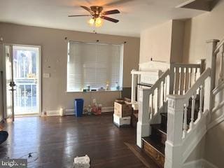 interior space featuring dark hardwood / wood-style floors and ceiling fan