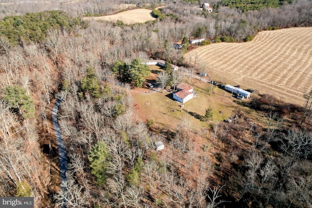 birds eye view of property featuring a rural view